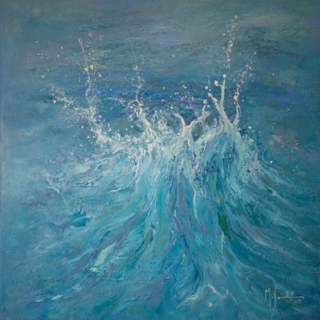 Olas de agua azul con salpicaduras que crean un efecto dinámico y vibrante.